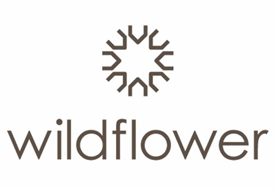 https://condoy.com/wp-content/uploads/2023/12/Wildflower-Homes-Logo.jpg